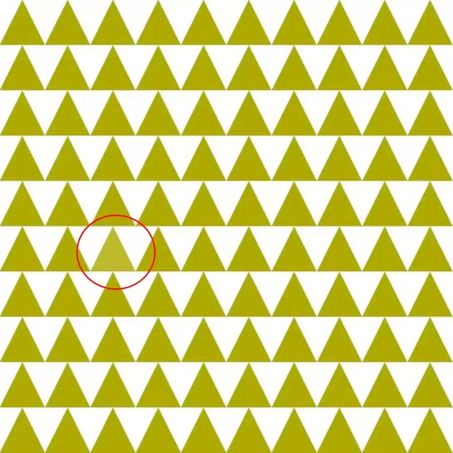 Test del QI sull'illusione ottica: bisogna fare attenzione a trovare i diversi triangoli colorati in questa immagine.